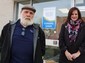 Lonny Napper, mayor of Plympton-Wyoming, and Carolyn Tripp, the municipality's CAO, stand outside the community's new health and wellness centre.