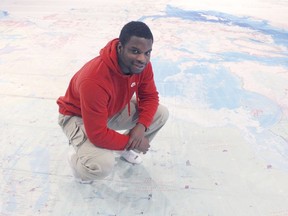 Jeremy Okonmah, attendant at the Timmins Museum, is encouraging everyone to come and check out the Indigenous Peoples of Canada Giant Floor Map created by the Royal Canadian Geographic Society. It is on display at the museum only until Nov. 7. 

RICHA BHOSALE/The Daily Press