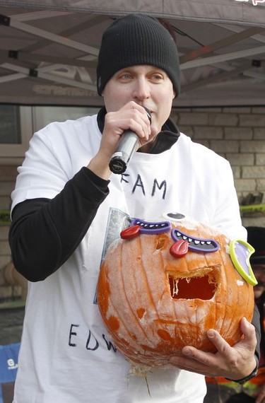 Jamie Klomp, a Timmins comic, entertains the crowd during a free outdoor all-ages Halloween party he hosted in Porcupine on Saturday.

RICHA BHOSALE/The Daily Press