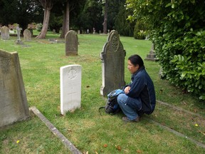 John Chookomolin's final resting place is in St. Jude's Cemetery in Englefield Green, UK, a small community on the outskirts of the city of London, England. Here we see Xavier Kataquapit at the grave of his great-grandfather during a visit to England more than 10 years ago.

Supplied