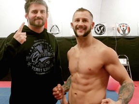 Matt Poulin, owner of Total Martial Arts Center, left, poses with Terry 'Good Time' Lemaire days before Lemaire was scheduled to travel to Alabama for a scheduled bout. Lemaire returned to his home community of Timmins this week, victorious.

Supplied
