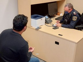 Timmins Police Const. Trevor Southcott interviews one of two international students from Northern College who participated in a mock event on Monday in order to test the Timmins Police Services new translation service.

Supplied