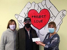 Western Auto Sales' Gord Wilson and June Woodburn dropped by Project Love recently, along with a donation of $1,000. Lyse Perron, kitchen co-ordinator, was on hand to accept the donation. The money will be used to purchase food and continue feeding those in need who come to the basement hall of Mountjoy United Church for a meal Mondays from 4 p.m. to 5:30 p.m.

Supplied
