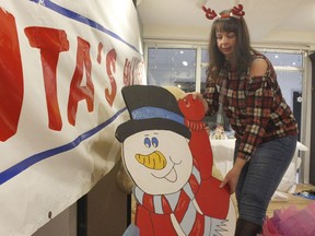 Stacey Martin, executive assistant with the Downtown Timmins Business Improvement Association, was setting up the 221 Third Ave, location for the upcoming Santa's workshop giving photo op with Santa for families in the town on four consecutive Saturdays starting on Nov. 28

RICHA BHOSALE/The Daily Press