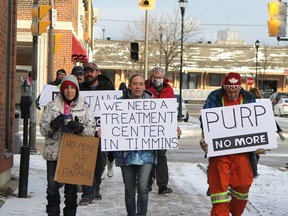 A dozen members of No More held a march in downtown Timmins Saturday afternoon, raising awareness about the risks of opioid use and the need for resources to address addiction issues in the community. They were joined by Timmins-James Bay MP Charlie Angus who is seen here in the second row taking part in the march.

RON GRECH/The Daily Press