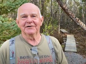 Larry Jones of Bobcaygeon was working on his property on the shores of Sturgeon Lake when he noticed a green bottle stuck in the mud. The bottle contained a message written by a Simcoe resident more than 30 years ago. Photo courtesy of Kawartha 411 News