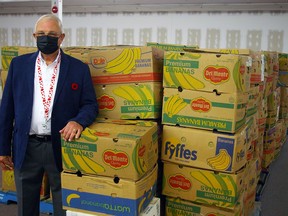 Christmas Care chair Worth Chisholm stands with boxes ready to be filled with food and presents for the annual campaign, which opened Friday in St. Thomas.Eric Bunnell/Special to the Times-Journal
