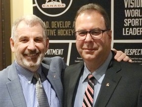 Former vice-president of hockey development with Hockey Canada Paul Carson, left with Kenora's Barry Reynard, who was recently re-elected to Hockey Canada's board of directors.