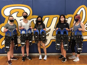 Saugeen District Senior School students show off some of the 53 new pairs of snowshoes the school was able to purchase after receiving a $3,000 grant from the Canadian Tire Jumpstart sports relief fund. Pictured from left to right are Leah Gowan, Bella Davidson, Sarah Etedali-Zadeh, Madeline Mirandaand Adrian Martin. Photo submitted.