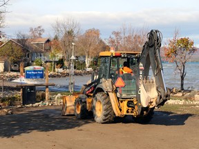 Bayfield Street in Meaford was closed Monday morning as crews worked to clear stones and debris from the road and the parking lot at Fred Raper Park. A windstorm Sunday evening caused wave rushes and flooding in the low-level shoreline area. Greg Cowan/The Sun Times