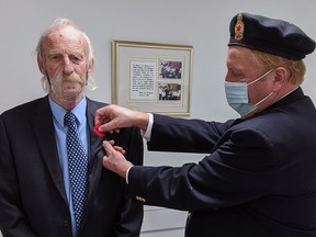 Millet Royal Canadian Legion Br. No. 226 President Garry Smith pins Millet Mayor Tony Wadsworth with the first poppy to kick of the Legion’s 2020 Poppy Campaign Oct. 28.
Every year, from the last Friday of October to Nov. 11, Canadians wear a Poppy as a visual pledge to honour Canada’s Veterans and remember those who sacrificed for the freedoms we enjoy today. While the Poppy is distributed freely to all who wish to wear one, the Legion gratefully accepts donations to the Poppy Fund.
The Poppy Campaign donations collected during the Poppy Campaign are held in Trust at the branch level to directly support Veterans and their families within their community and to help ensure Canadians ‘never forget’.