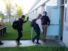 Scott Barr, principal at Ecole McTavish, welcomes students back to school on Tuesday, September 1, 2020. Laura Beamish/Fort McMurray Today/Postmedia Network