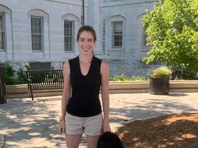 Indie, a standard poodle, with new handler Emma-Jane Hamilton during a training session in July.