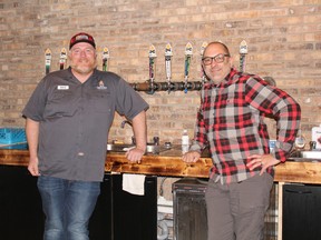 Mike Harrison, left, president of New Ontario Brewery in North Bay, and Brian Wilson pose behind the counter at the facility. Wilson recently joined New Ontario after serving at Highlander Brewing in South River since its inception in 2009.
PJ Wilson/The Nugget