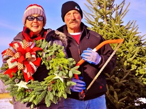 Catie Metcalfe and Gene Bystryk of Cagene Christmas Tree Farm of Simcoe say it’s been a good season for selling Christmas trees due to an apparent province-wide shortage. – Monte Sonnenberg