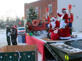 Santa and Mrs. Calus greet donors to the North Bay Food Bank in a drive-by visit, Saturday morning.
PJ Wilson/The Nugget