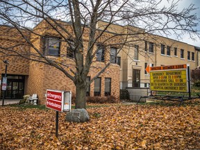 One year after being placed outside the Clinton Public Hospital, the same sign informs of the temporary closure of the hospital's overnight emergency department closure. Handout