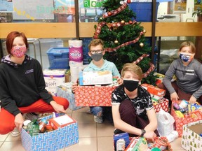 Students at E.E. Oliver School have been working with their classroom to complete foodbank bingo cards in hopes to win a tray of donuts for their class.