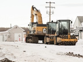 Heavy equipment sits parked ready to be removed in Sexsmith on Dec. 3, 2020, after some flood mitigation work has paused for the winter. The town hopes to have the entire project completed by the end of summer 2021.