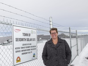 Sexsmith mayor Kate Potter stands near the municipality’s new solar array, which came in service recently. The project was built on land reclaimed from the town’s former landfill.