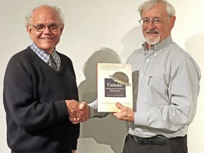 Historians Graeme Mount, left, and Dieter Buse have been awarded the Ontario Historical Society's Fred Landon Award for their two-volume set Untold: Northeastern Ontario's Military Past. PHOTO BY SUPPLIED