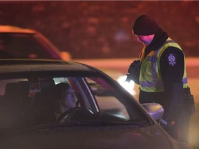 The Government of Alberta has announced stricter impaired driving regulations, as of Dec. 1, 2020. Pictured, the Edmonton Police Service’s Impaired Driving Unit kicked off its annual Holiday Checkstop campaign with the goal to help keep impaired drivers off the city streets on Thursday, Dec. 6, 2018, in Edmonton. PHOTO BY GREG SOUTHAM / Postmedia, file