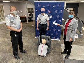 L-R: Ray Lux, Deputy Chief, Paramedic Services, Steve Schaus, Director/Chief, Paramedic Services, and Angela Freiburger of Marvin Freiburger and Sons Inc.