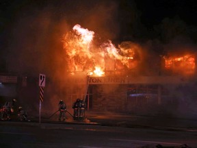 Kingston Fire and Rescue respond to a fire at the corner of Bath Road and Westdale Avenue on Tuesday night.