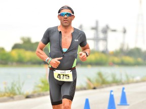 Tillsonburg's George Papadakos, shown here running in the Montreal Esprit Triathlon, plans to run 31 marathons in January to raise funds for the Alzheimer Society. (Submitted)