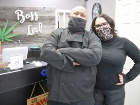 Mike Jourdy, owner of Flippin' Mike's Restaurant, and Melodie Boyle, owner of Boss Leaf, are teaming up for a new Christmas Eve event in Tillsonburg, Flippin' Bosses Christmas. Jourdy, Boyle and their families will be supplying free takeout Christmas dinners to those in need on Dec. 24th. Donations for the event are being accepted at the restaurant and store. (Chris Abbott/Postmedia Network)