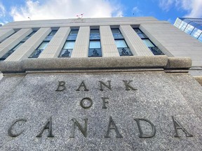 The Bank of Canada building is seen in Ottawa in April 2020. The Bank of Canada will deliver an interest rate announcement on Tuesday, Dec. 9 with observers watching if news about vaccines gives a shot in the arm to the bank's outlook on the economy. ADRIAN WYLD/The Canadian Press