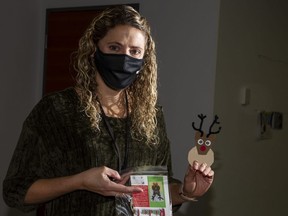 Jamie-Lee Cormier, Curatorial Assistant, Learning. the Grande Prairie Art Gallery, holds up one of the creativity kits and final project that the gallery is providing to any groups that want some. The kits can be used by all ages from two to 80.