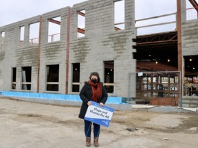 Leah Logan, Indwell's regional manager, stands outside of the future Dogwood Suites affordable housing building in downtown Simcoe. (ASHLEY TAYLOR)