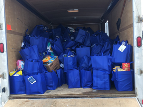 The trailer that was used to transport the bags of foodbank donations had been filled twice with generous donations from community members.