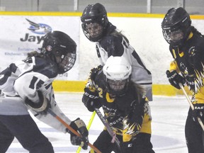 Abby Paulen (22) of the Mitchell U12 (Ward) ringette team keeps possession of the ring against visiting St. Marys during recent action at the Mitchell & District Arena. ANDY BADER