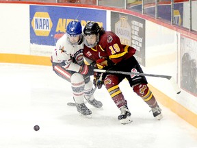 Timmins Rock forward Josh Dickson, shown here battling with Canadians blue-liner Avery Chisholm behind the Rayside-Balfour net during an NOJHL game at the McIntyre Arena on Nov. 21, has been named one of the Eastlink TV 3 Stars of the Week. Dickson scored the game-winning goal as the Rock edged the Hearst Lumberjacks 2-1 at the McIntyre Arena on Sunday afternoon, recording his 100th NOJHL point in the process. THOMAS PERRY/THE DAILY PRESS