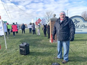 Mike Kisch, first vice-president of Unifor Local 2458, speaks at a rally outside the Fairfield Park long-term care home in Wallaceburg on Dec. 8. Jake Romphf/Courier Press