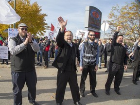 A crowd of 2,000 listen to speakers at the East Elgin Community Centre during a protest against public health measures in Aylmer on Nov. 7. Derek Ruttan/Postmedia Network