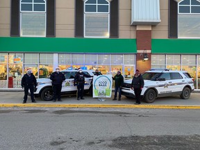 The Beaumont RCMP and Municipal Enforcement teamed up for the Stuff a Cruiser food bank in support of the Leduc and District Food Bank on Dec. 12.
(Supplied)