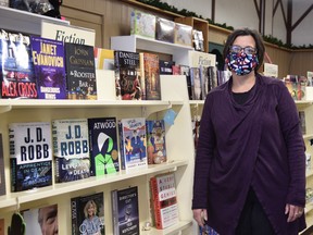 The Merrifield book Shop in downtown Woodstock is closing its doors at the end of this year, citing the impacts of the COVID-19 pandemic. Pictured, Diane Janssen, who co-owns the shop with sister-in-law Lisa Janssen. (Kathleen Saylors/Woodstock Sentinel-Review)