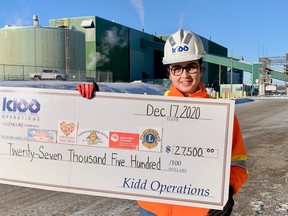 Victoria Whissel, communications and community relations coordinator with Glencore Kidd Operations, holds a giant cheque representing a number of donations made this holiday season. SUBMITTED PHOTO