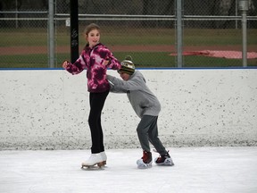 Although the J.L. Scott McLean Outdoor Recreation Pad was crowded with hockey players, the Hutchinson siblings from Tillsonburg were able to have some fun on the outdoor ice last weekend. Town staff are reminding people that sticks and pucks are not currently allowed on the outdoor rink as a safety precaution. (Chris Abbott/Norfolk & Tillsonburg News)