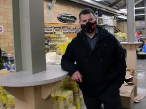 Denis Goupil from Harvest King Food Services, which provided many of the food items for the North Bay Santa Fund was on hand Tuesday morning as the hampers were packed at Memorial Gardens.
PJ Wilson/The Nugget