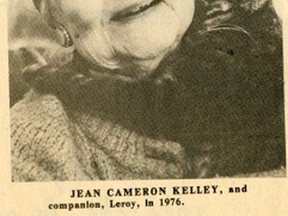 •	cat008 – An August 25, 1976, Record-Gazette photograph captures the affection between Jean Cameron Kelley and companion, Leroy. She and Leroy, a stray she adopted a year earlier, shared a “tiny white cottage” in Peace River.