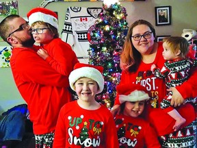 Photo supplied Richard (Ricky) Dixon turned 11 years old on Dec. 4. Ricky is in Joe’s (daddy) arms next to mom Amber holding Makaelynn, and in front are Christian and Brookelynn. The family of six gathered at their Christmas tree last December for a family picture.