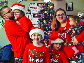 Photo supplied
Richard (Ricky) Dixon turned 11 years old on Dec. 4. Ricky is in Joe’s (daddy) arms next to mom Amber holding Makaelynn, and in front are Christian and Brookelynn. The family of six gathered at their Christmas tree last December for a family picture.