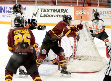 Timmins Rock captain Derek Seguin watches as the puck bends the twine in behind Hearst Lumberjacks goalie Liam Oxner during the second period of Tuesday night’s NOJHL contest at the McIntyre Arena. Seguin’s second goal of the night and NOJHL-leading 12th of the season put the Rock up 2-0 in a game they would go on to win 3-2. THOMAS PERRY/THE DAILY PRESS