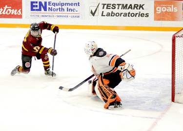 Timmins Rock forward Harry Clark fires a shot past Hearst Lumberjacks goalie Liam Oxner for what would prove to be the game-winning goal during Tuesday night’s NOJHL contest at the McIntyre Arena. Clark’s third goal of the season, late in the second period, put the Rock in front 3-0 in a game they would have to hang on to edge the Lumberjacks 3-2. THOMAS PERRY/THE DAILY PRESS