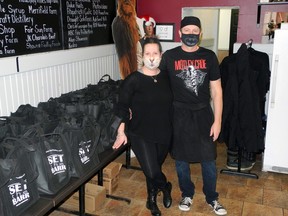 Karen Boucher and Stef Jones in their Noshery restaurant with their 'care bags.' Wayne Lowrie/Recorder and Times