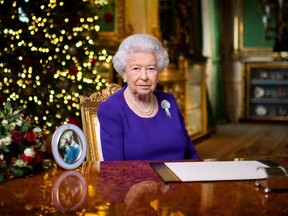 Britain's Queen Elizabeth II records her annual Christmas broadcast in Windsor Castle, Berkshire, England Thursday. Victoria Jones/Pool via REUTERS